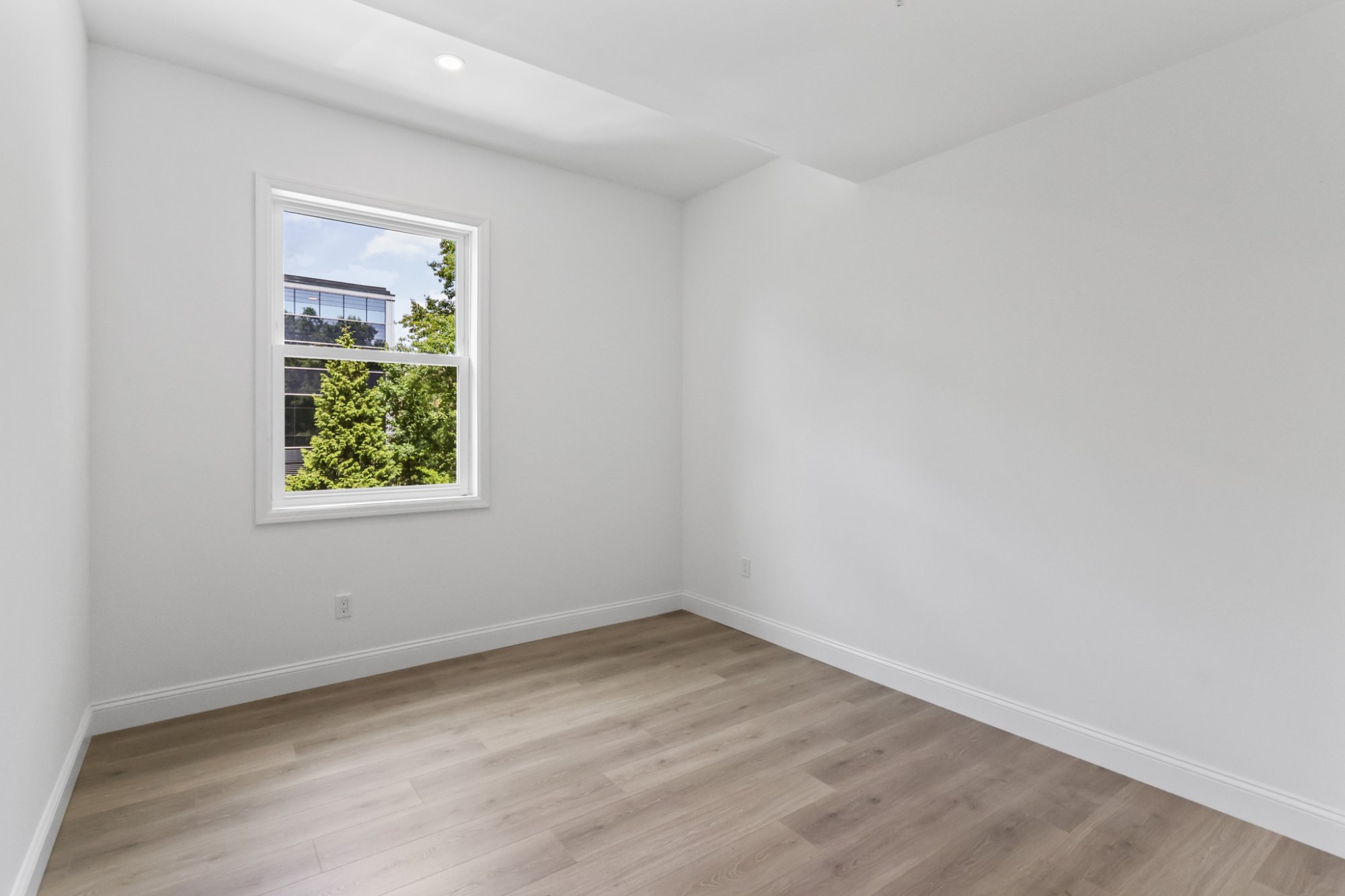 Bedroom with doors to living