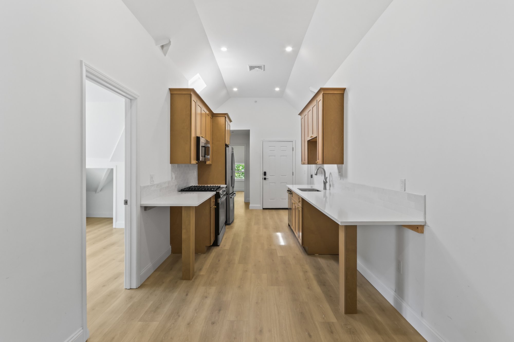 Vaulted loft space with angled ceiling