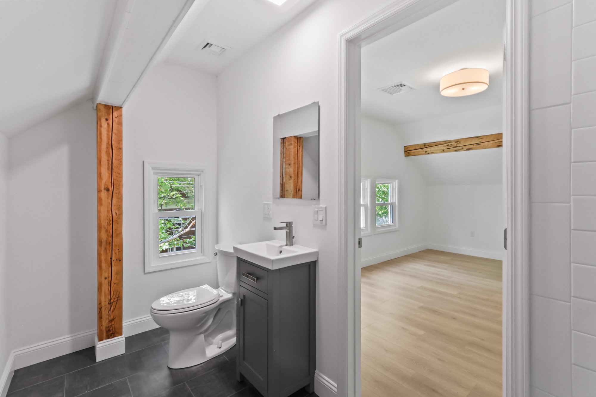 Bedroom vaulted with kitchen view