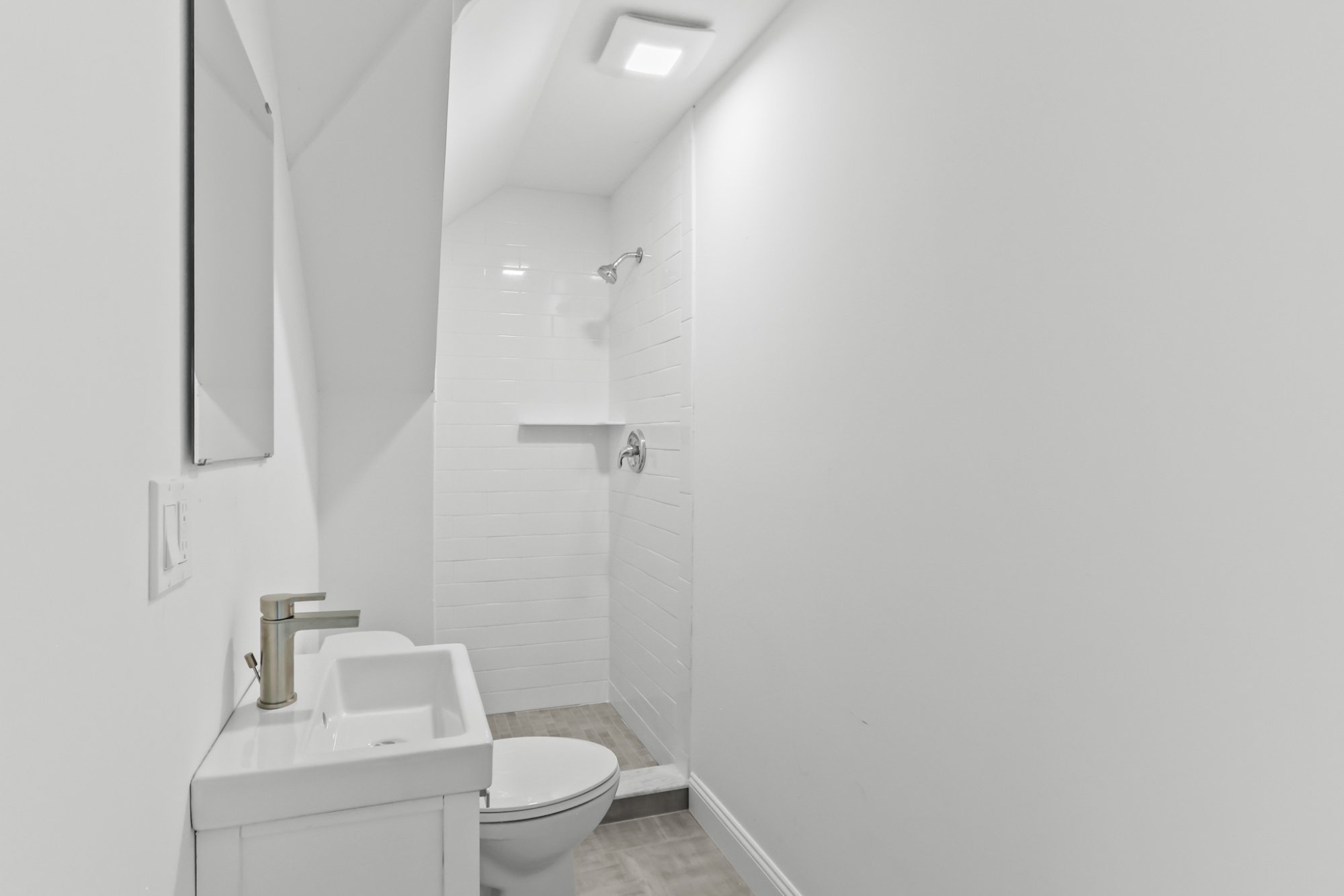 Bedroom vaulted with triple windows