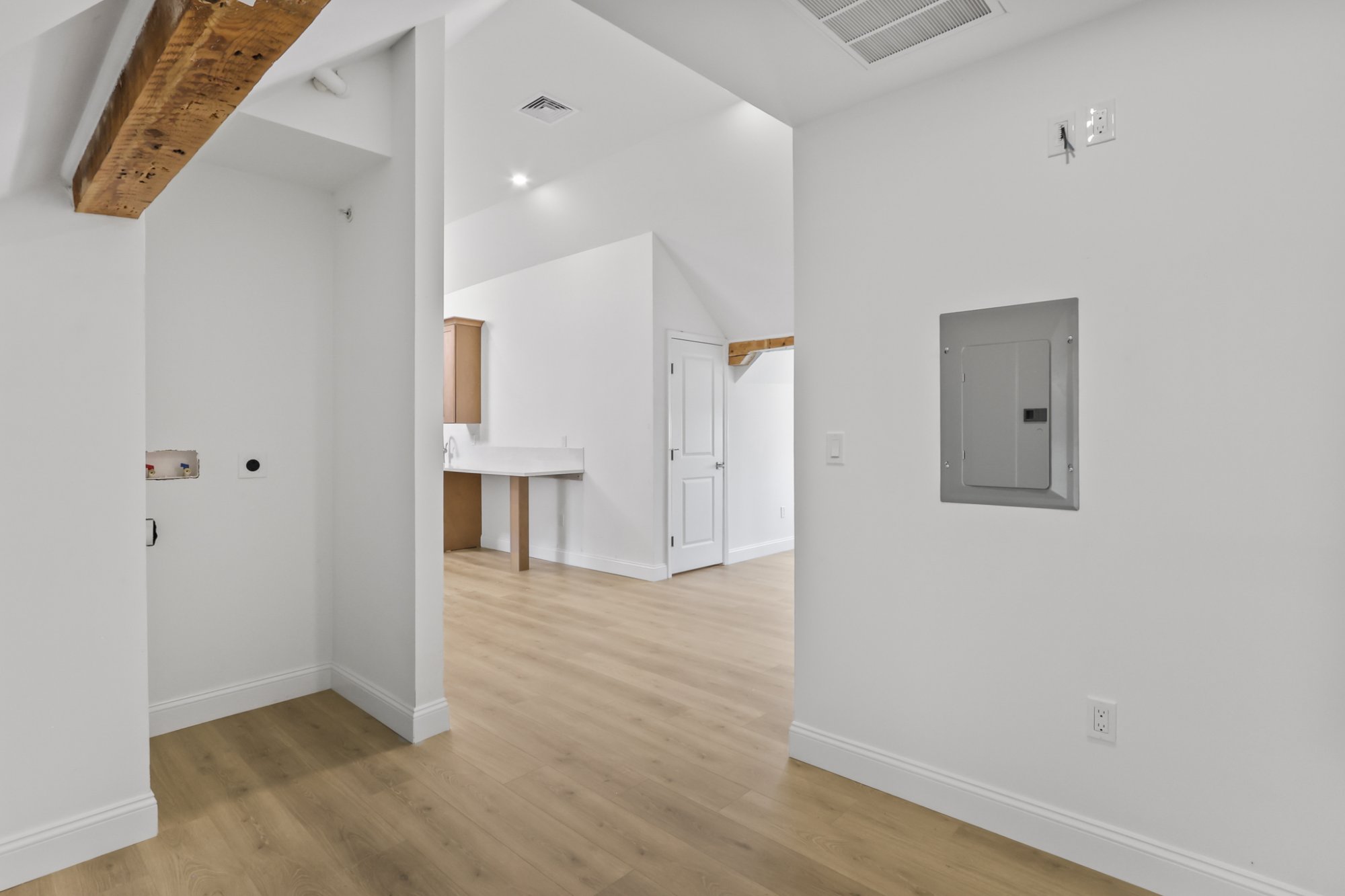 Bedroom exposed beam window tree views