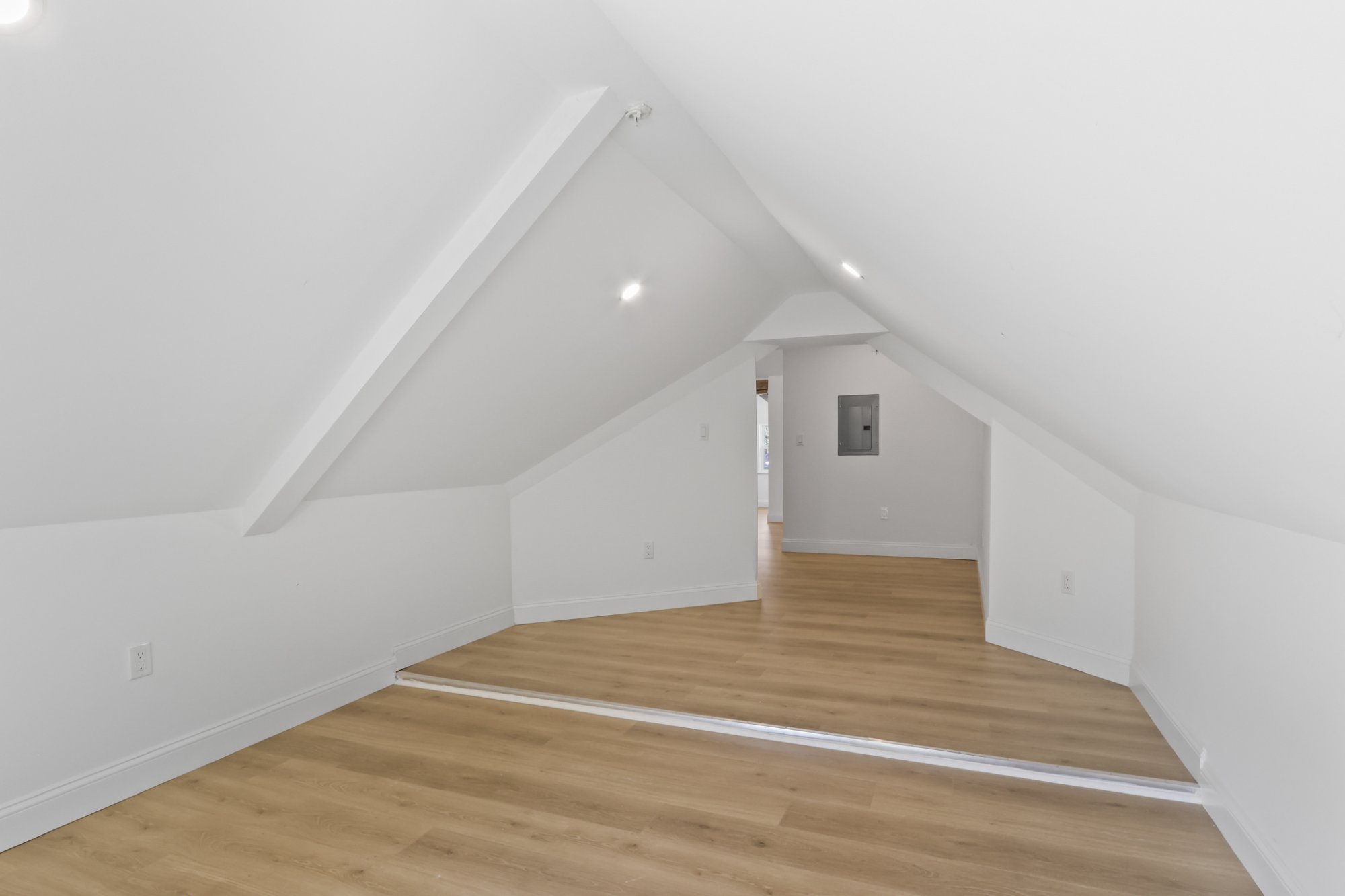 Bedroom vaulted with triple windows